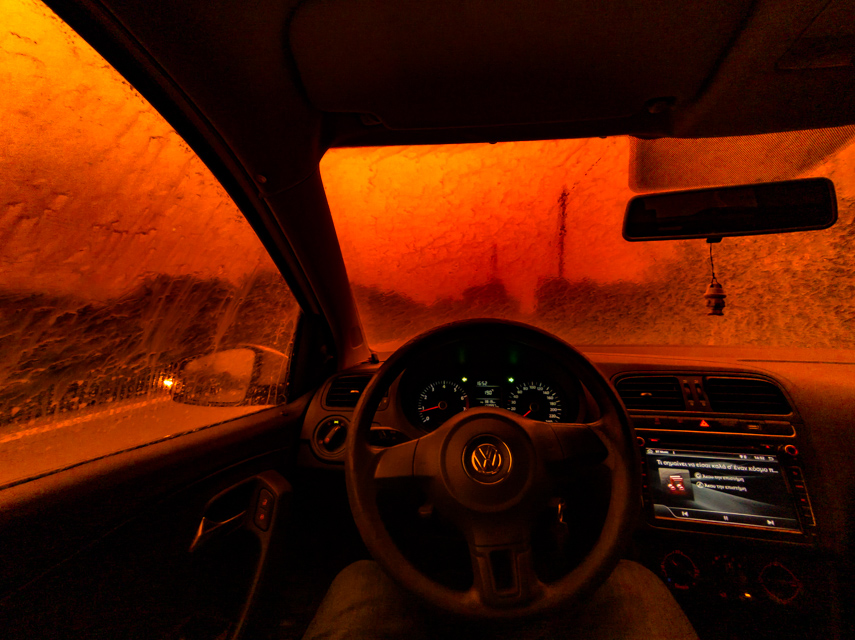 Car interior illuminated by orange light